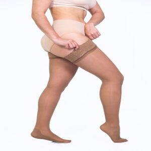 Medias liga de compresion 140 mujer Medivaric 15-20 mmHg beige hasta el muslo elegante transparente